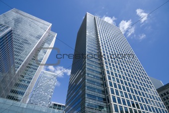 Glass skyscraper on blue sky