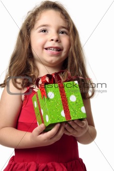 Excited girl holding a present