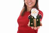 santa woman holding small christmas box in the hand
