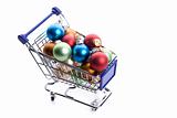 shopping cart full with colorfull christmas balls