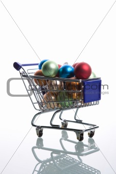 shopping cart full with christmas balls