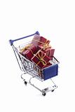 shopping cart full with red christmas present box