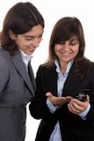 businesswoman with team partner looking at mobile phone