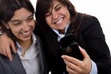 businesswoman with partner laughing with mobile phone