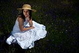 beautiful woman in white dress relaxing in the nature