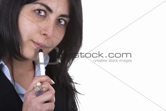 young beautiful businesswoman holding pen