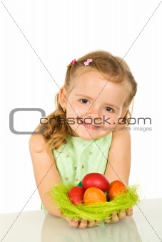 Cute little girl with easter eggs