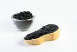 soft black caviar with bread and butter