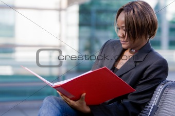 African american business woman with folder