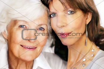 Senior mother and mature daughter