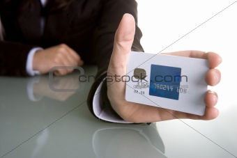 businesswoman holding credit card in the hand