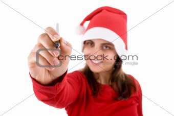 young santa woman writing in the screen her present wishlist