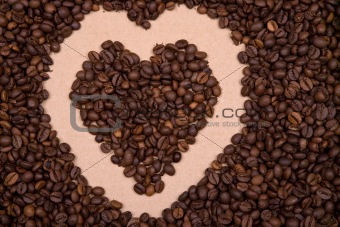 heart shape background made with coffee beans