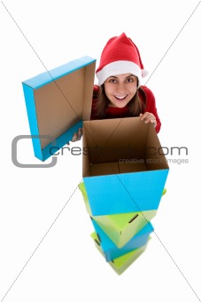 young girl with surprised expression after opening christmas pre