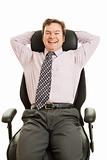 Happy Executive in Ergonomic Chair