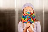Little girl with a lollipop