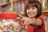 child in sweet shop