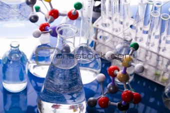 Glass in laboratory and atom
