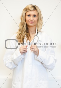 Blonde doctor looking at the camera