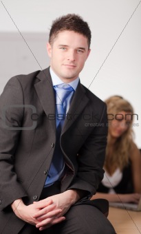 Businessman in Front of team