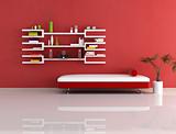 modern red and white couch and bookcase