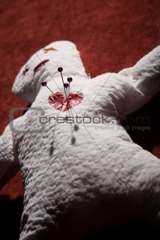 Voodoo Doll with Pins in its Heart