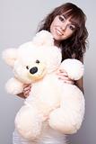 beautiful girl with a teddy bear