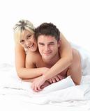 loving Couple relaxing on bed 