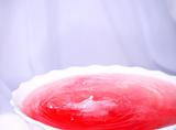 Red splash in a dish