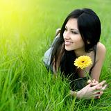 beautiful young woman with flower