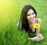beautiful young woman with flower