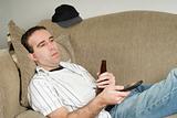 Male With Beer Watching TV
