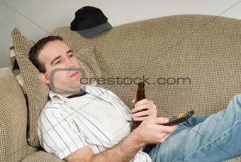 Male With Beer Watching TV