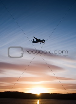 Airplane in sunset