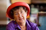 Senior Woman Wearing Red Hat