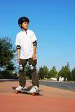 Teen Boy on Skateboard