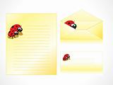 letterhead with ladybug background and envelope
