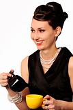 Smiling Stylish Lady in Classic Outfit Serving Coffee or Tea 
