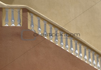 Plaster balistrade railing and stucco wall
