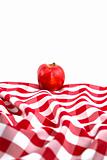 Red Gala Apple on Checkered Tablecloth