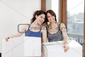 friends holding boxes