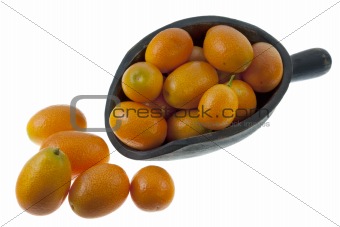 rustic scoop of kumquats