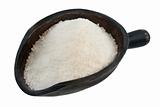 scoop of white powder (sweetener)