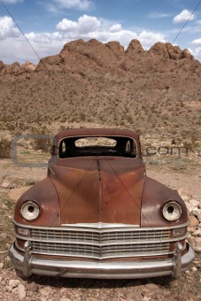 Old Rusted Out Car in the Desert