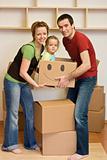 Happy family with a kid moving into a new home