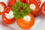 stuffed tomatoes on a white plate