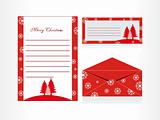 xmas envelope and letter head in red with tree and snow
