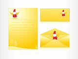 xmas envelope and letter head in yellow with cartoon