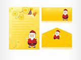 xmas envelope and letter head in yellow with santa