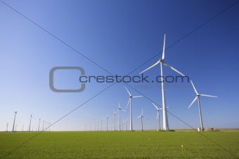 Windmills in Holland producing green energy to help against global warming